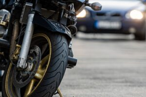 a motorcycle parked on the sidewalk with a defocus 2022 11 04 22 08 38 utc scaled