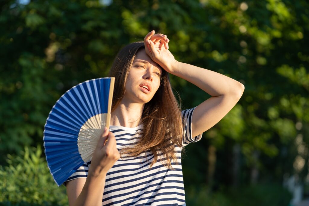 young woman suffer heatstroke outdoors unhappy gi 2022 11 15 04 07 42 utc 1024x683