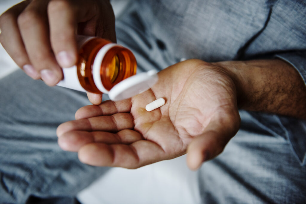 man taking medicine 2022 12 15 22 55 34 utc 1024x683