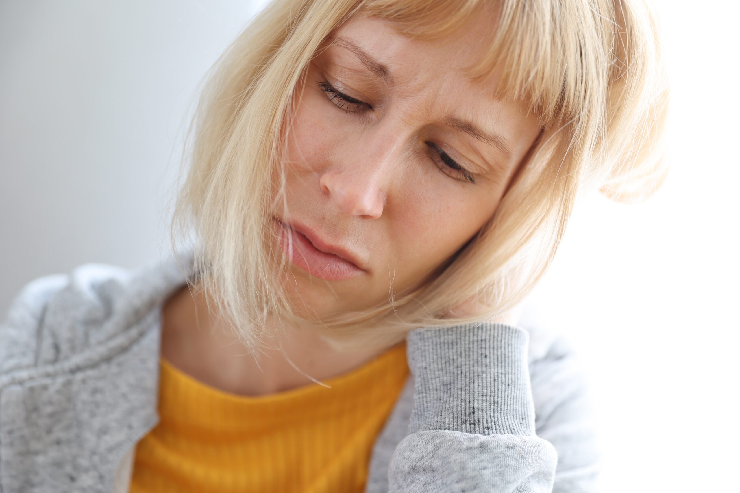 portrait of a frustrated woman on a white backgrou 2022 11 12 08 53 20 utc scaled