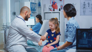 doctor checking child arm 2023 11 27 04 49 43 utc scaled