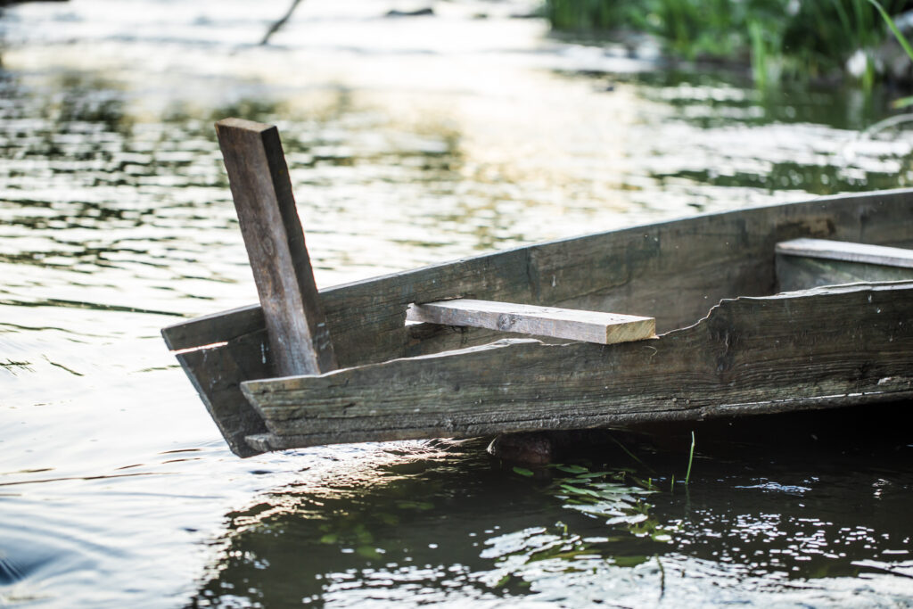 old wooden boat on the river 2023 11 27 05 25 39 utc 1 scaled