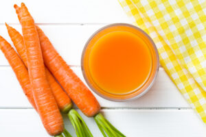 top view of carrot juice in glass 2023 11 27 04 49 44 utc scaled