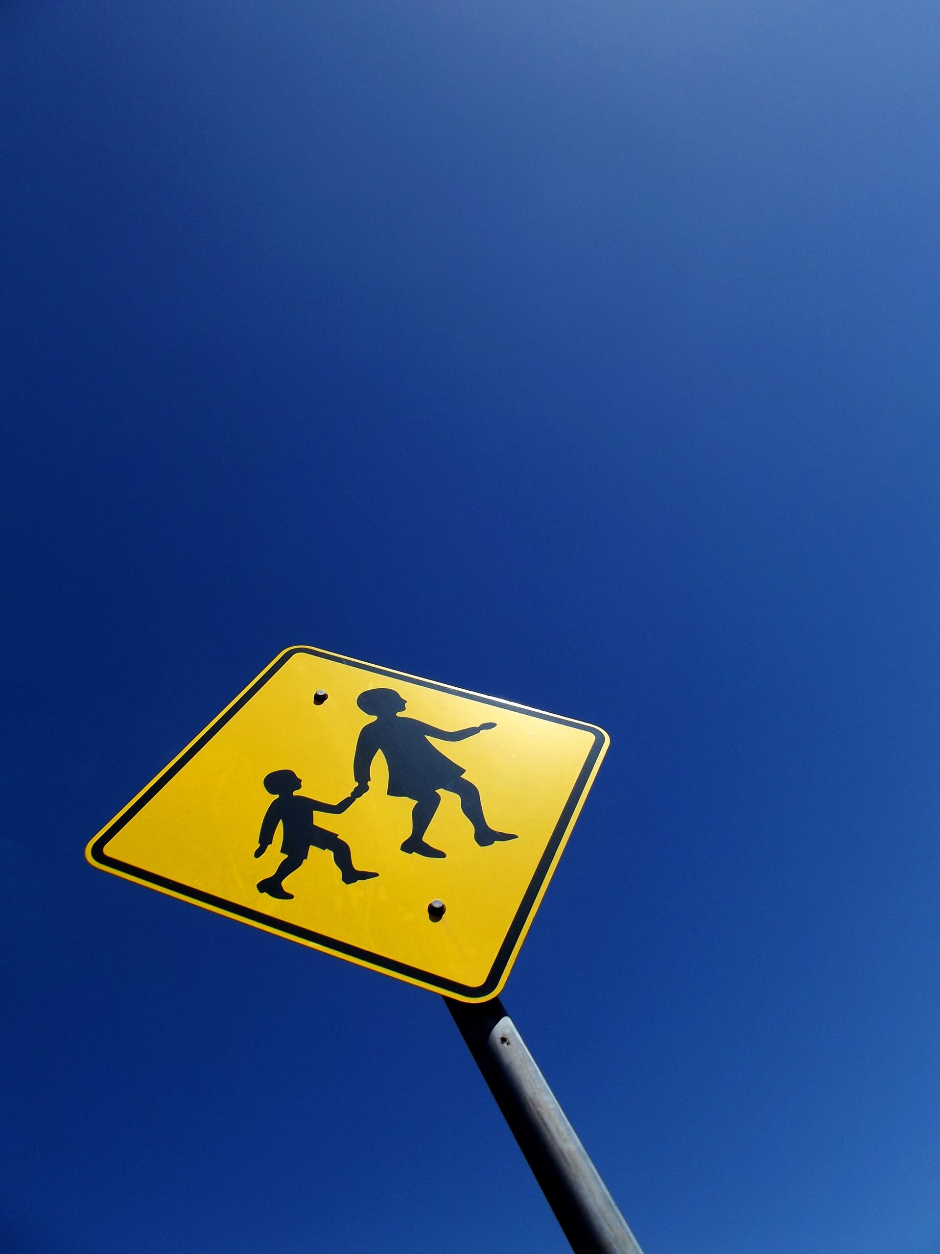 children crossing near a school safety sign 2023 11 27 04 57 09 utc scaled