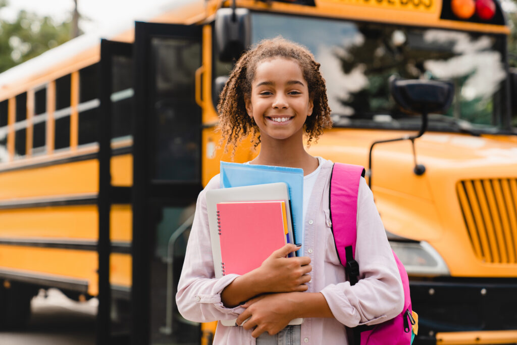 smiling african american schoolgirl going back to 2023 11 27 04 51 16 utc scaled