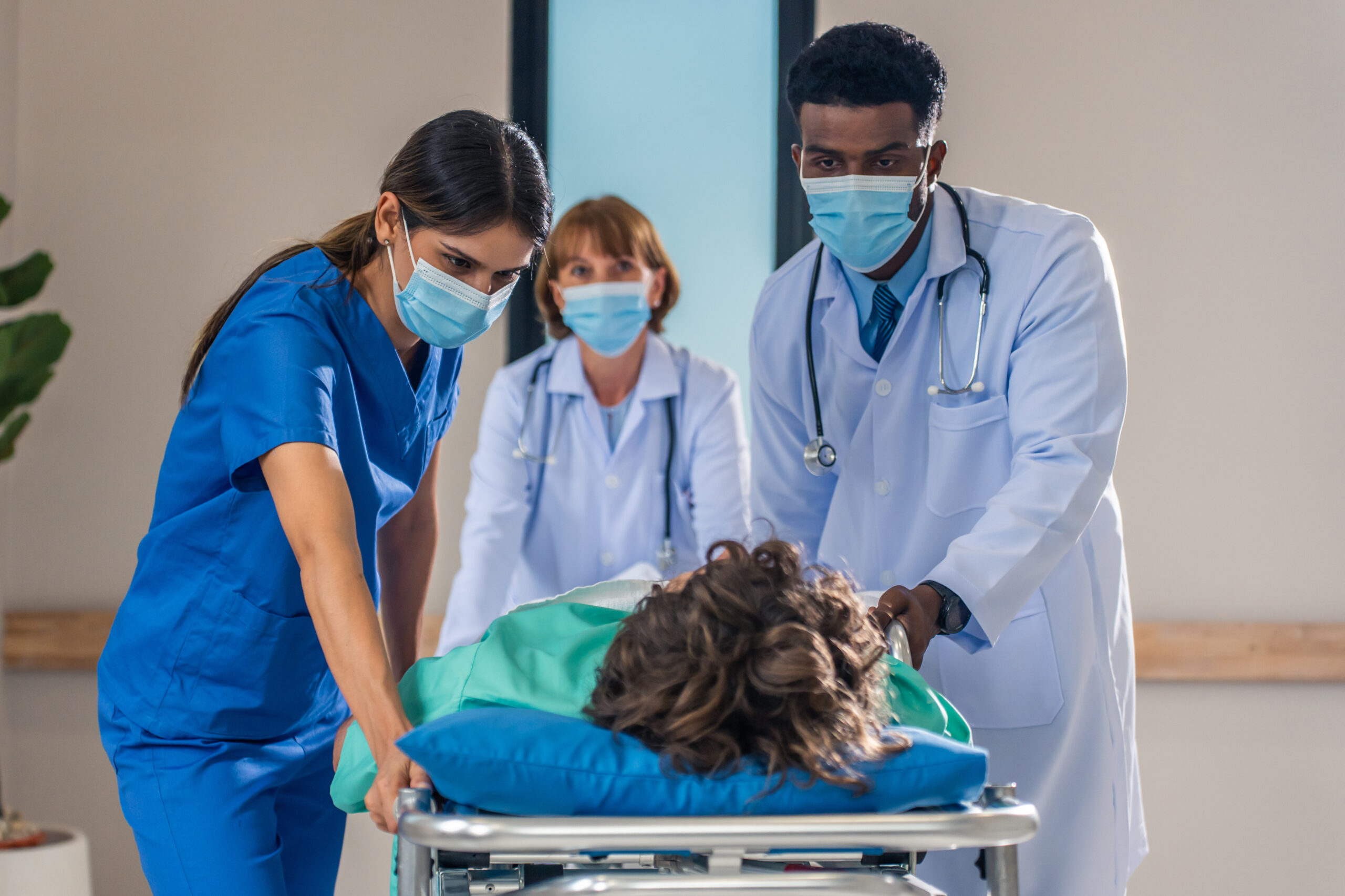 group of diverse doctors moving seriously injured 2023 11 27 05 19 54 utc scaled