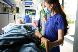 woman medic makes a dropper to an injured patient 2023 11 27 05 00 32 utc scaled