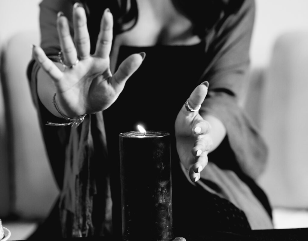 magic ritual with black candle 2023 11 27 05 12 46 utc scaled