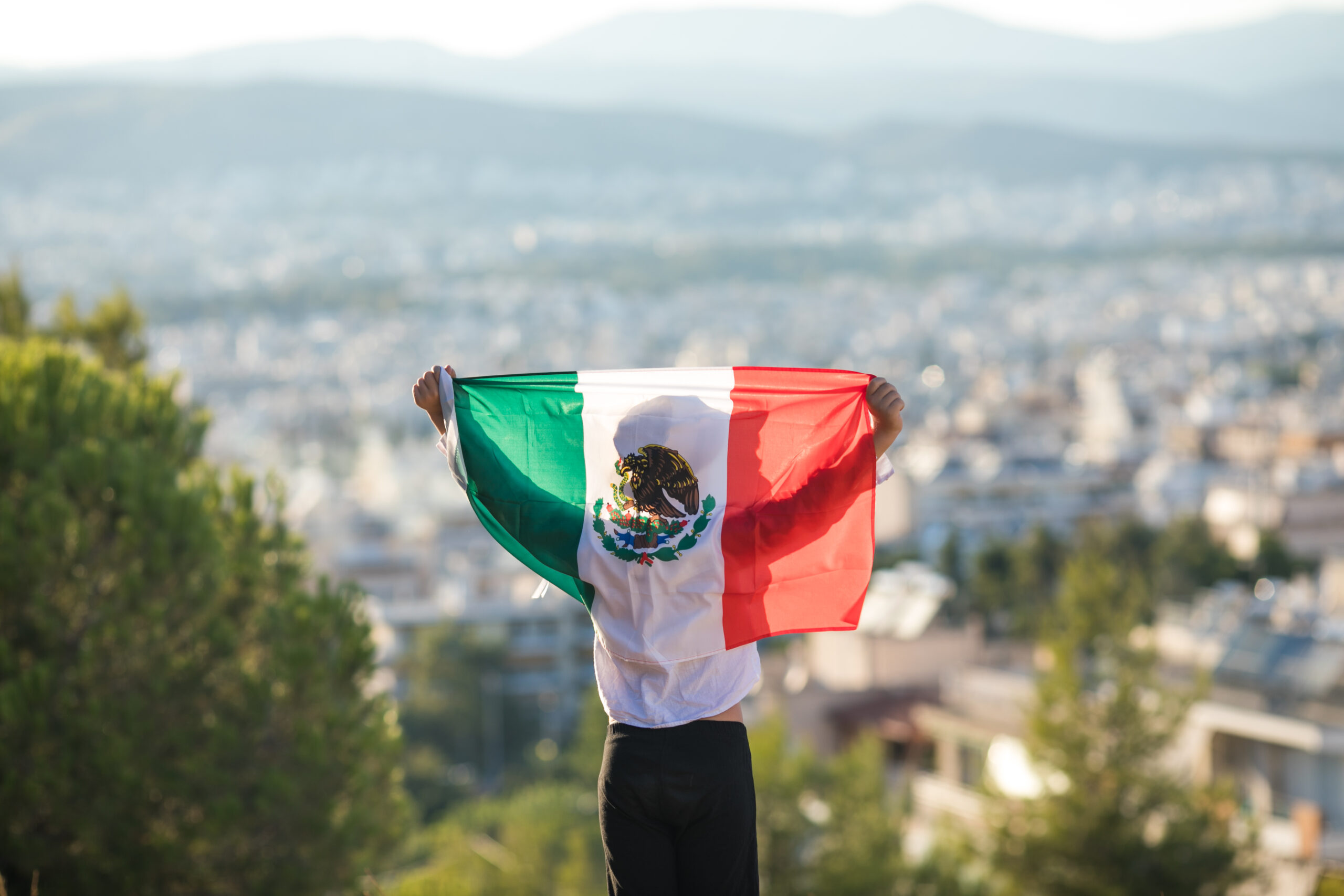 people holding flag of mexico september 16 inde 2023 11 27 05 22 37 utc scaled