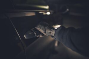thief hand on a door handle 2023 11 27 05 06 49 utc scaled