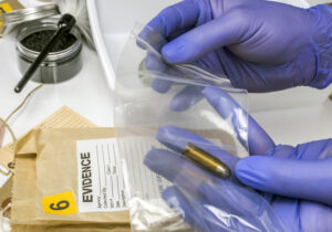 scientific police picking up bullet in evidence ba 2023 11 27 04 55 39 utc scaled